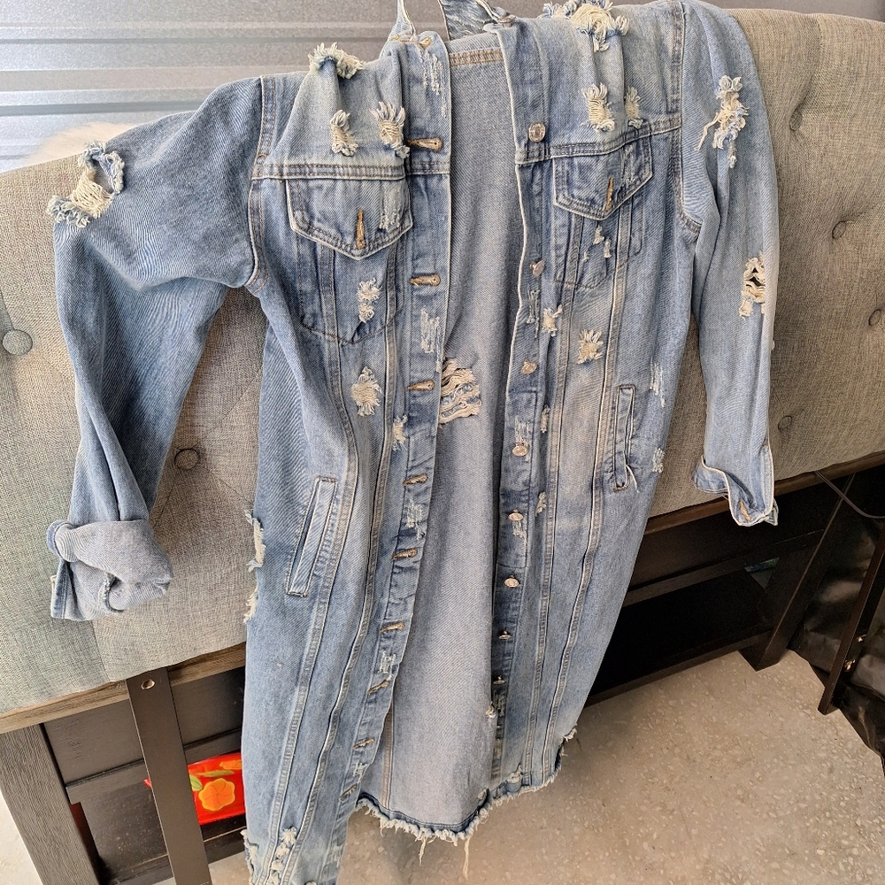 Long distressed denim jacket